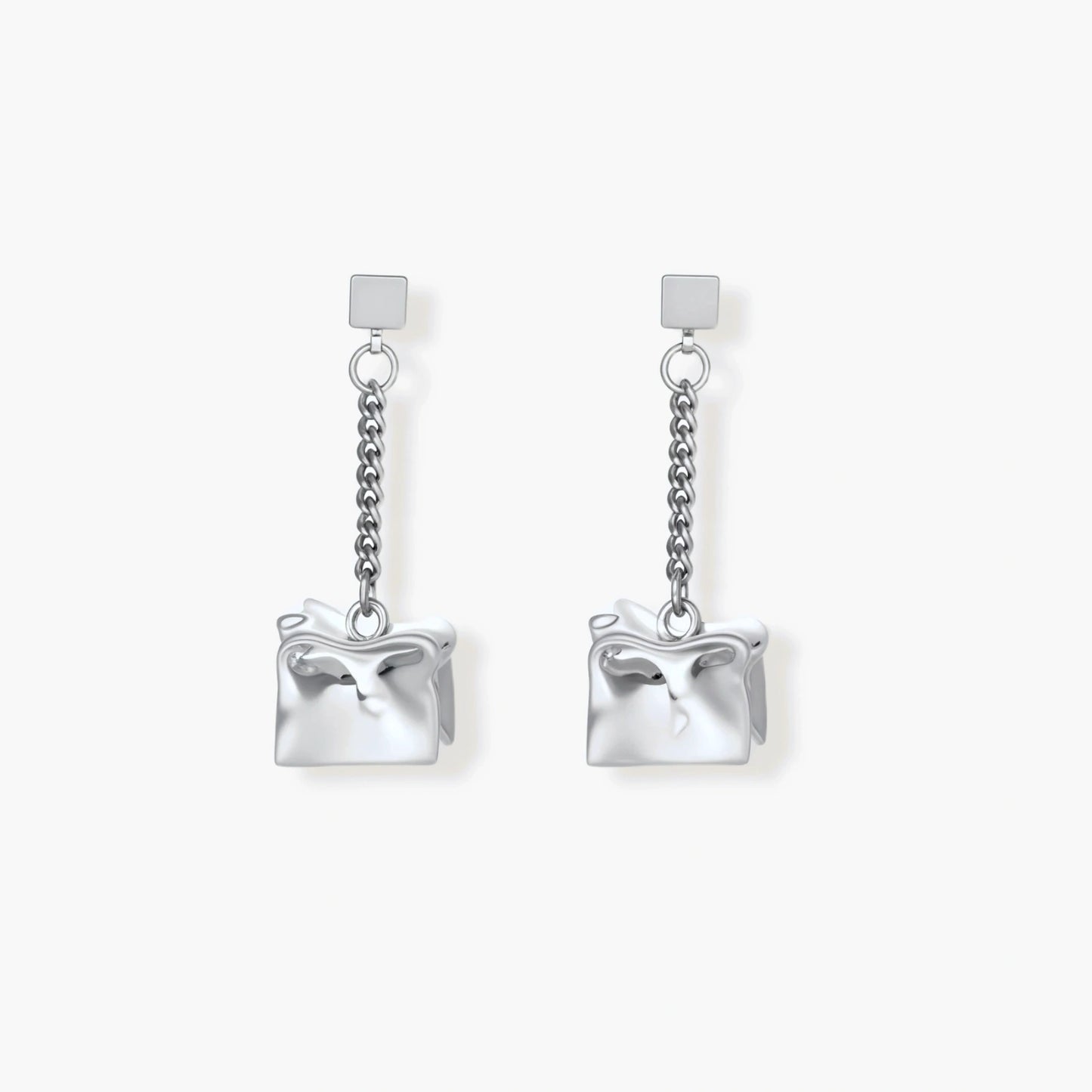 Geometric jewelry set with textured cube pendants on chains, featuring eco-zinc alloy in silver and gold finishes.